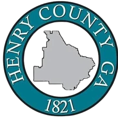 Logo of Henry County with a map and circile around it